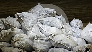 Bags with potatoes in the refrigerated warehouse