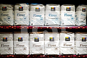 Bags of white flour from Whole Foods Market