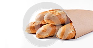 Baguette bread in paper bag on white background