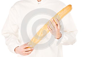 Baguette in a hands of a backer