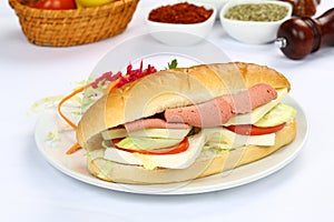 Baguette sandwich with ham and cheese