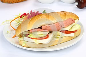 Baguette sandwich with ham and cheese