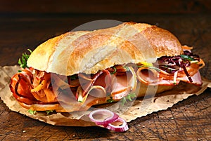 Baguette sandwich with ham and onion