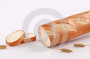 Baguette slices on white background