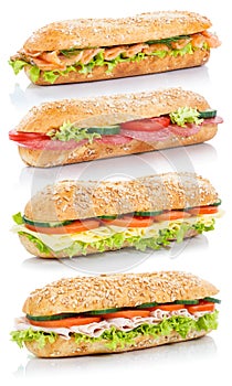 Baguette sub sandwiches with salami ham cheese salmon fish stack