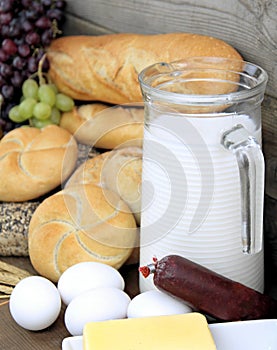 Baguette and various breads and foods on Wall background