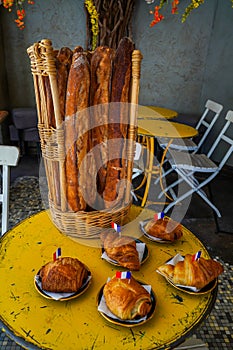 Baguettes, croissants and pain au chocolat in french cafe