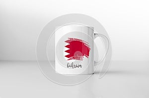 Bahrain flag on white coffee mug.