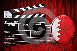 Bahraini cinematography, film industry, cinema in Bahrain. Clapperboard with and film reels on the red fabric, 3D rendering