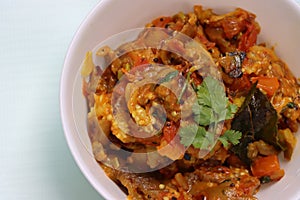 Baigan Bharta or Vangyache Bharit, a roasted and mashed eggplant fry or curry, favourite maharashtrian curry, served in a bowl, In