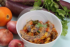 Baigan Bharta or Vangyache Bharit, a roasted and mashed eggplant fry or curry, favourite maharashtrian curry, served in a bowl, In