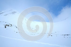 Baikal mountains in winter in snow. Forest in snow covered mount