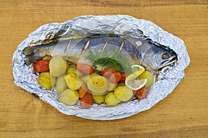 Baikal omul baked with potatoes