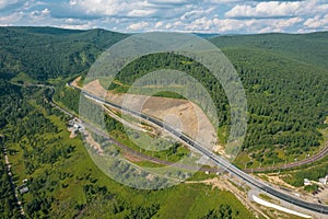 The Baikal serpentine road - aerial view of natural mountain valley with serpantine road, Trans-Siberian Highway, Russia