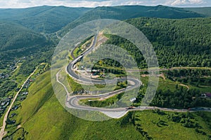 The Baikal serpentine road - aerial view of natural mountain valley with serpantine road, Trans-Siberian Highway, Russia