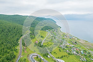 The Baikal serpentine road - aerial view of natural mountain valley with serpantine road, Trans-Siberian Highway, Russia