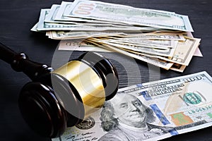 Bail bond and financial penalty. Gavel and money.