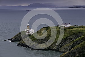 The Bailey Lighthouse in Dublin Bay on a misty Day