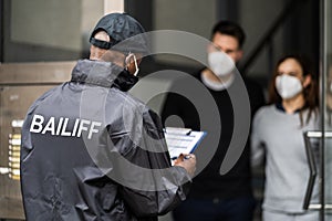 Bailiff Debt Collector At Door photo