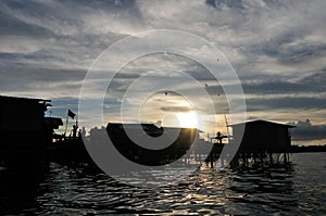 Bajau fisherman's wooden hut sunset