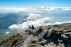 Bajawa - A couple dowing down the volcano Inierie photo