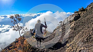 Bajawa - A girl going down the volcano Inierie photo