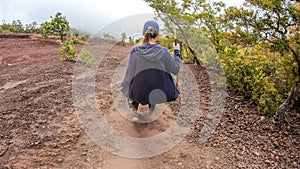 Bajawa - A girl going down the volcano Inierie photo