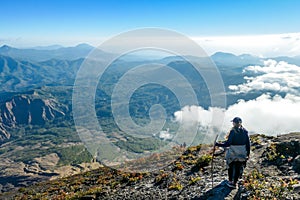 Bajawa - A girl going down the volcano Inierie photo