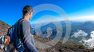 Bajawa - A man taking a selfie while going down the Inierie Volcano photo