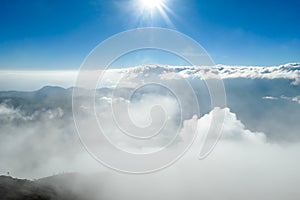 Bajawa - Sun shining above the clouds photo