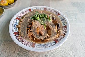 Bak Kut Teh, stew of pork and herbal soup on bowl
