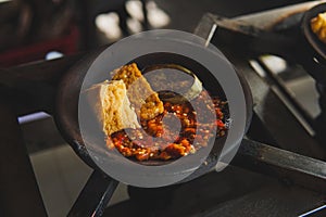 Bakaran or the process of grilling tahu tempe with sambal chili sauce