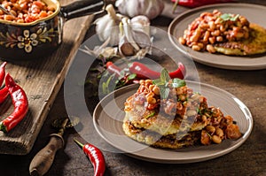 Bake beans with fluffly potato cakes