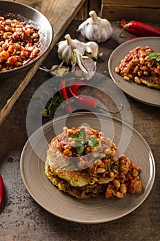 Bake beans with fluffly potato cakes