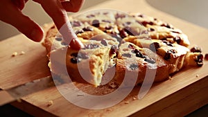 bake tea cake with pear cranberry closeup on wooden board