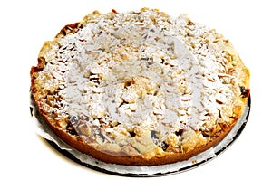 Baked apple pie with icing sugar