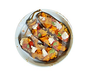 Baked aubergine stuffed with roast pumpkin, feta