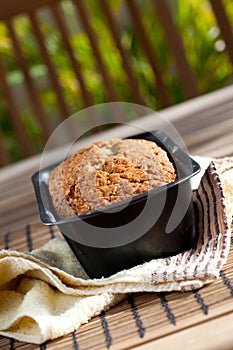 Baked banana bread on wooden table