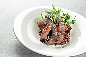 baked barbecue chicken wings with sesame, banner, menu, recipe place for text, top view