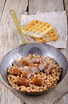 Baked beans with sausage and waffles