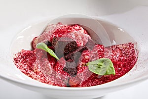 Baked beet and goat cheese espuma appetizer photo