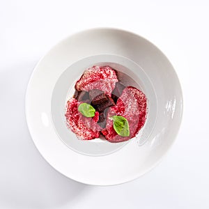 Baked beet and goat cheese espuma appetizer top view photo