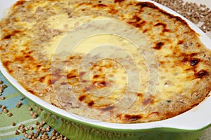 Baked buckwheat mash in baking pan