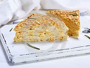 Baked cakes Napoleon with cream