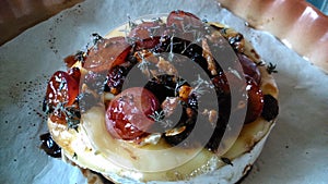 baked camembert with caramelized grapes and thyme