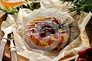 Baked camembert cheese served with the addition of cranberry jam
