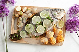 Baked carp with potato and cauliflower