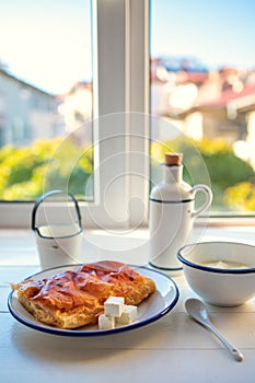 Baked cheese pie. Bulgarian butter banitsa for breakfast photo