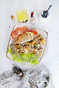 baked chicken breast with mushroom quinoa and salad