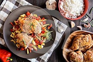 Baked chicken breast stuffed with cheese, tomato and basil with rice and steamed vegetable salad